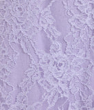 Turn heads at Prom 2025 in this lavender prom dress, where statement-making details meet the iconic style of the Cadie Halter Corset Slit Lace Formal Dress.
