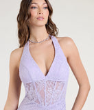 Turn heads at Prom 2025 in this lavender prom dress, where statement-making details meet the iconic style of the Cadie Halter Corset Slit Lace Formal Dress.
