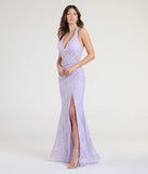 Turn heads at Prom 2025 in this lavender prom dress, where statement-making details meet the iconic style of the Cadie Halter Corset Slit Lace Formal Dress.