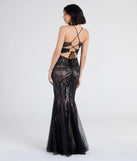 Turn heads at Prom 2025 in this black prom dress, where statement-making details meet the iconic style of the Brooke Lace-Up Mermaid Sequin Mesh Formal Dress.