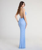 Turn heads at Prom 2025 in this periwinkle prom dress, where statement-making details meet the iconic style of the Kerry Open Back Bodycon Pearl Bead Formal Dress.
