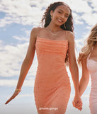 Turn heads at Prom 2025 in this orange prom dress, where statement-making details meet the iconic style of the Kerry Open Back Bodycon Pearl Bead Formal Dress.