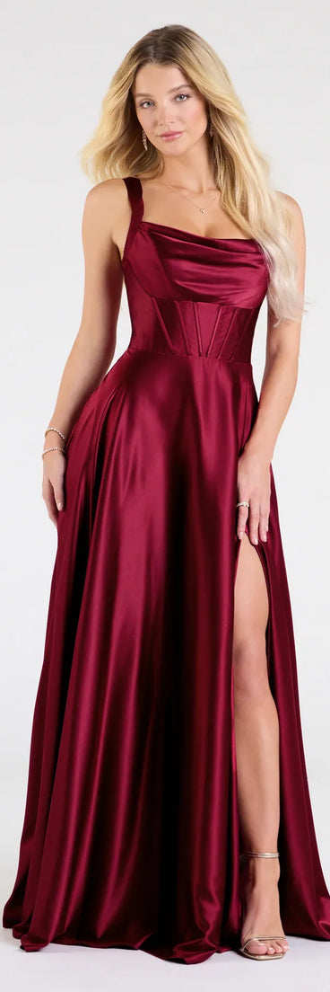 Own the spotlight in the Daphne Corset Slit A-Line Satin Formal Dress, a burgundy formal dress crafted to deliver luxe style for summer weddings, Army Balls, or any special event.