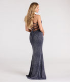 Turn heads at Prom 2025 in this navy blue prom dress, where statement-making details meet the iconic style of the Carina Lace-Up Mermaid Glitter Formal Dress.