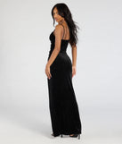 The Azella Bodycon Slit Glitter Velvet Formal Dress is a show-stopping black prom dress, offering a sleek, slimming silhouette that enhances your natural beauty for an unforgettable night.