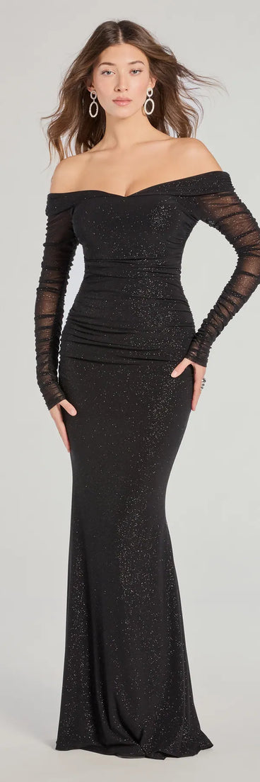 Turn heads at Prom 2025 in this black prom dress, where statement-making details meet the iconic style of the Victoria Off-The-Shoulder Glitter Mermaid Formal Dress .