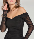 The Victoria Off-The-Shoulder Glitter Mermaid Formal Dress is a show-stopping black prom dress, offering a sleek, slimming silhouette that enhances your natural beauty for an unforgettable night.