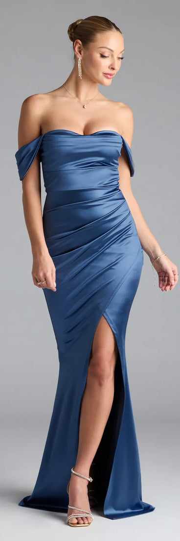Feel instantly put-together in the Belinda Off-The-Shoulder Slit Satin Formal Dress in denim blue, a stylish wedding guest dress designed for confident style and all-out celebration.