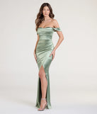 Turn heads at Prom 2025 in this sage green prom dress, where statement-making details meet the iconic style of the Belinda Off-The-Shoulder Slit Satin Formal Dress.