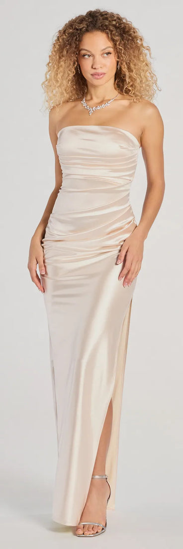 Own the spotlight in the Brianna Satin Strapless High Slit Column Dress, a ivory formal dress crafted to deliver luxe style for autumn weddings, Military Balls, or any special event.