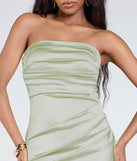 The Brianna Satin Strapless High Slit Column Dress in sage is a stunning green prom dress designed to capture attention with its fresh or bold color and effortlessly stylish silhouette.