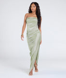 The Brianna Satin Strapless High Slit Column Dress in sage is a stunning green prom dress designed to capture attention with its fresh or bold color and effortlessly stylish silhouette.