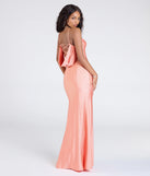 Turn heads at Prom 2025 in this peach prom dress, where statement-making details meet the iconic style of the Lizzie Lace-Up Cowl Back Slit Formal Dress.