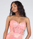 Make a bold statement in the Zoe Lace-Up Corset Mermaid Sequin Formal Dress in coral, the perfect spring dress for weddings, cocktail hours, nights out, and/or seasonal celebrations.