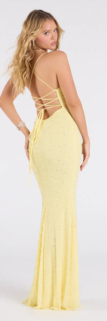 Make a bold statement in the Marlene Lace-Up Mermaid Beaded Pearl Formal Dress in yellow, the perfect summer dress for weddings, cocktail hours, nights out, and/or seasonal celebrations.