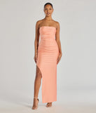 The Anisley Strapless High Slit Slim Formal Dress in luxe peach fabric, a stunning prom dress with statement details designed to make a bold impression at Prom 2025.