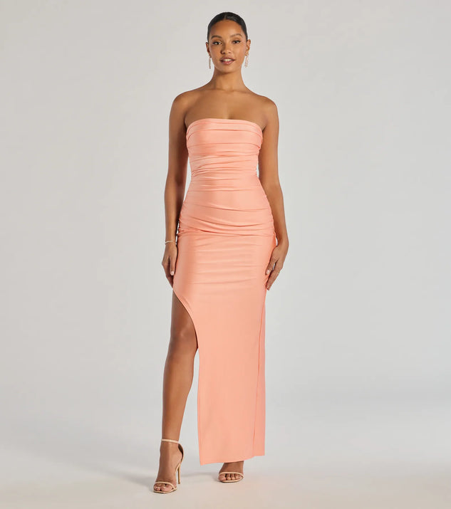 The Anisley Strapless High Slit Slim Formal Dress in luxe peach fabric, a stunning prom dress with statement details designed to make a bold impression at Prom 2025.