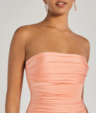 The Anisley Strapless High Slit Slim Formal Dress in luxe peach fabric, a stunning prom dress with statement details designed to make a bold impression at Prom 2025.