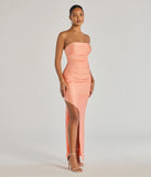 The Anisley Strapless High Slit Slim Formal Dress in luxe peach fabric, a stunning prom dress with statement details designed to make a bold impression at Prom 2025.