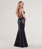 The Saskia Lace-Up Mermaid Sequin Satin Formal Dress is a show-stopping black prom dress, offering a sleek, slimming silhouette that enhances your natural beauty for an unforgettable night.