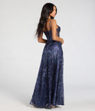 Step into the Prom 2025 dance in the Lauren Sweetheart A-Line Glitter Sequin Dress in navy, a stunning blue prom dress designed to complement any theme with its timeless allure and statement-making style.