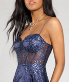The Lauren Sweetheart A-Line Glitter Sequin Dress in luxe navy blue fabric, a stunning prom dress with statement details designed to make a bold impression at Prom 2025.