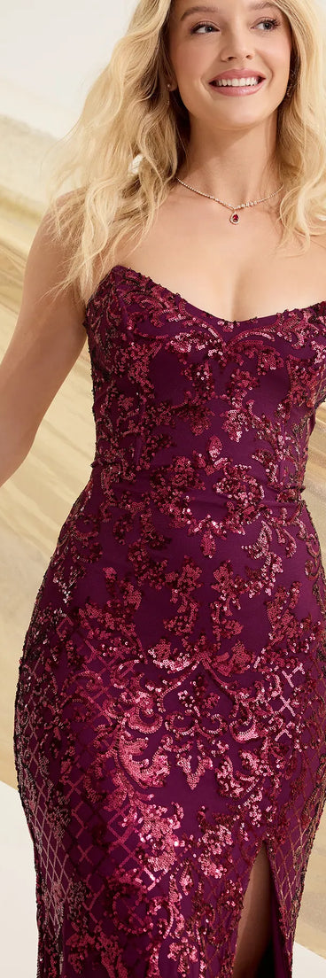 Turn heads at Prom 2025 in this plum prom dress, where statement-making details meet the iconic style of the Chandler Strapless Lace-Up Sequin Formal Dress .