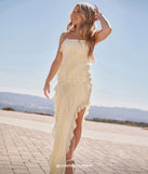 Turn heads at Prom 2025 in this yellow prom dress, where statement-making details meet the iconic style of the Gabby Formal Mesh Strapless Ruffle Long Dress.