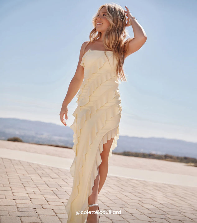 Turn heads at Prom 2025 in this yellow prom dress, where statement-making details meet the iconic style of the Gabby Formal Mesh Strapless Ruffle Long Dress.