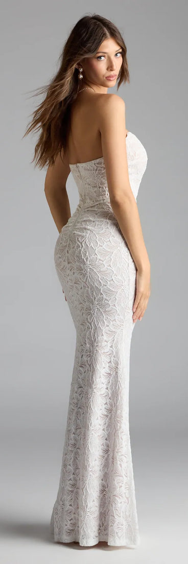 Own the spotlight in the Frida Strapless Mermaid Lace Formal Dress, a white formal dress crafted to deliver luxe style for summer weddings, Army Balls, or any special event.