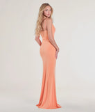 The Lilliana Cowl Neck Knit Mermaid Dress in luxe orange fabric, a stunning prom dress with statement details designed to make a bold impression at Prom 2025.