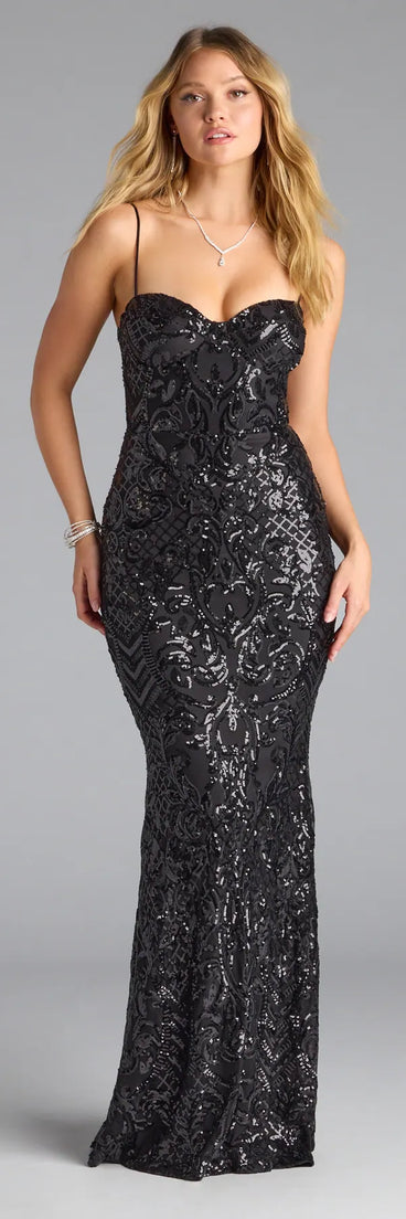 Step into summer looking effortlessly chic in the Jessie Sweetheart Mermaid Sequin Formal Dress in black, a must-have Windsor dress for your warm-weather wardrobe.