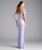 Turn heads at Prom 2025 in this lavender prom dress, where statement-making details meet the iconic style of the Faye Cold Shoulder Mermaid Beaded Formal Dress.