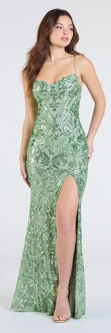 Feel instantly put-together in the Carrie Sequin Corset Mermaid Dress in sage green, a summer wedding guest dress designed for confident style and all-out celebration.