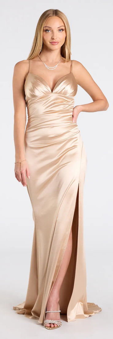 Feel instantly put-together in the Jordyn Formal Satin Mermaid Dress With Train in gold, a stylish wedding guest dress designed for confident style and all-out celebration.