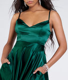Make a bold statement in the Emilie Satin Tie-Back A-Line Formal Dress in hunter green, the perfect green dress for weddings, cocktail hours, nights out, and/or seasonal celebrations.