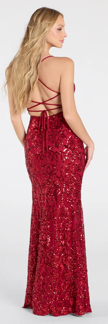 Make a statement in the Violetta Sequin Lace-Up Mermaid Dress, a bold red prom dress designed to exude confidence, elegance, and a striking prom-night look.