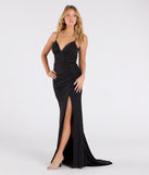 The Rhonda Strappy Back Slit Glitter Formal Dress is a show-stopping black prom dress, offering a sleek, slimming silhouette that enhances your natural beauty for an unforgettable night.