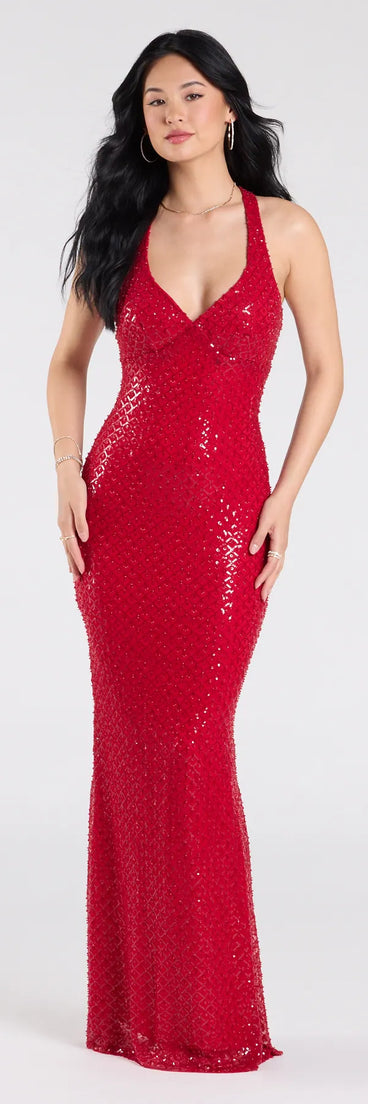 Own the spotlight in the Vanessa Open Back Mermaid Sequin Formal Dress, a red formal dress crafted to deliver luxe style for autumn weddings, Military Balls, or any special event.