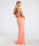 The Celina Sequin Lace-Up High Slit Mermaid Dress in luxe orange fabric, a stunning prom dress with statement details designed to make a bold impression at Prom 2025.