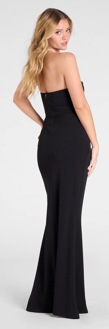 The Maude Strapless High Slit Mermaid Dress is a show-stopping black prom dress, offering a sleek, slimming silhouette that enhances your natural beauty for an unforgettable night.