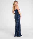 The Jillian Sequin Slit Long Formal Dress in teal is a stunning green prom dress designed to capture attention with its fresh or bold color and effortlessly stylish silhouette.