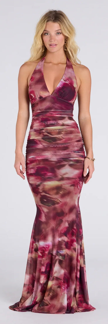 Feel instantly put-together in the Kelsey Halter Printed Mermaid Formal Dress in plum, a stylish wedding guest dress designed for confident style and all-out celebration.