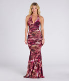 The Kelsey Halter Printed Mermaid Formal Dress in luxe plum fabric, a stunning prom dress with statement details designed to make a bold impression at Prom 2025.