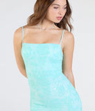 The Kimber High Slit Floral Sequin Mermaid Dress in mint is a stunning green prom dress designed to capture attention with its fresh or bold color and effortlessly stylish silhouette.