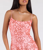 The Khloe Strappy Back Mermaid Sequin Formal Dress in luxe coral fabric, a stunning prom dress with statement details designed to make a bold impression at Prom 2025.