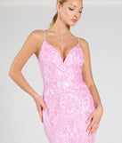 You’ll feel stylish and confident in the Kensie V-Neck Mermaid Sequin Formal Dress as your 2025 Prom Dress to stand out at your dance or event.