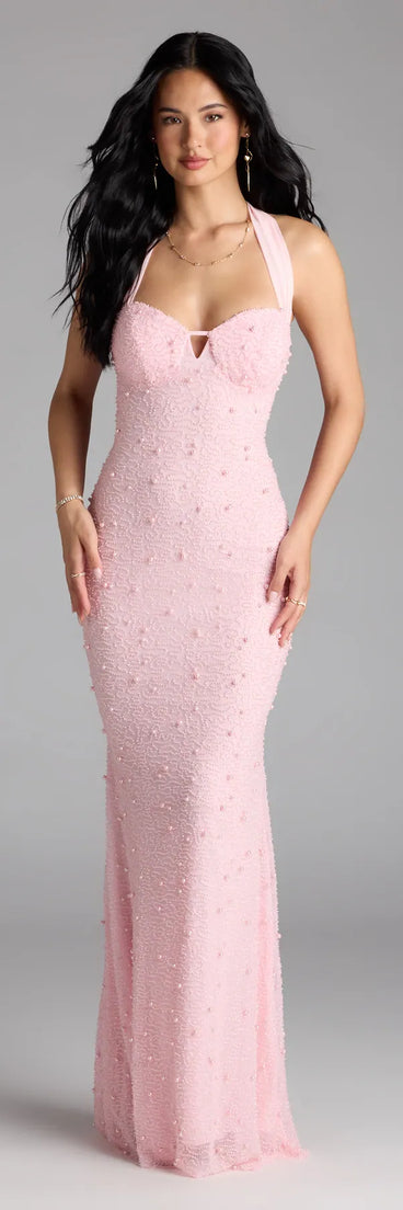 Bring a fun and feminine vibe with the Calla Halter Mermaid Pearl Beaded Formal Dress, a scroll-stopping style from Windsor's pink homecoming dress collection that brings playful charm to every HOCO moment.