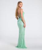 The Ashleigh Lace-Up Corset Sequin Formal Dress in sage is a stunning green prom dress designed to capture attention with its fresh or bold color and effortlessly stylish silhouette.