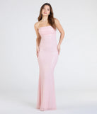 Turn heads at Prom 2025 in this pink prom dress, where statement-making details meet the iconic style of the Adrianna Strapless Mermaid Sequin Bead Formal Dress.